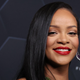 Rihanna poses for a picture as she celebrates her beauty brands Fenty Beauty and Fenty Skin on February 11, 2022 in Los Angeles, California.